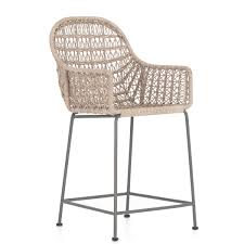 Incredibly durable, renewable, and rich in tonal variation, these swivel counter stools are handwoven of seagrass and abaca that will get even softer and more beautiful over time. Bandera Indoor Outdoor Wicker Counter Stool