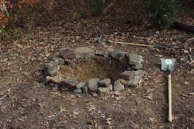 The actual fire pit itself will be deeper than the patio surround to accommodate the height of the concrete blocks. How To Build A Secret Backyard Fire Pit The Art Of Manliness