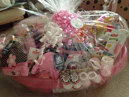 Other ideas include nail clippers, a baby brush, or even a bathtub faucet cover. Baby Shower Gift Basket Diy Baby Shower Gifts Baby Girl Shower Gifts Baby Shower Girl Gifts Basket
