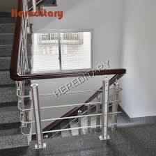 Metals, like steel, aluminum and wrought iron, are popular choices for commercial and industrial settings and contemporary environments, where wood provides a more classic appearance. China Steel Rod Railing Design Photos In Stair Parts With Wooden Handrail China Balcony Railing Design In India Square Pipe Balcony Railing