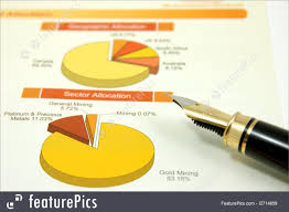 Office And Close Up Close Up Of Pie Chart With Fountain Pen
