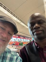 Stranger's Kindness in Johannesburg, Invitation to Zimbabwe Conference