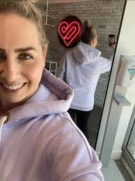 How oversized is the ERAS TOUR THROUGH VANCOUVER BLACK HOODIE?