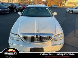 Image result for Light Ice Blue 2006 Town Car