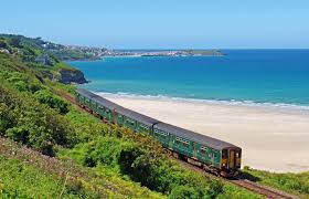 Porth ia, meaning st ia's cove) is a seaside town, civil parish and port in cornwall, england. St Ives Bay Line Train Travel Guide