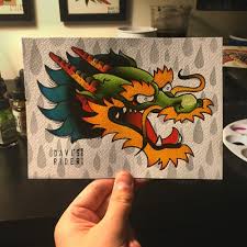 Below, we've compiled pictures of the best dragon head tattoos designs and ideas. The Art Of Davis Rider Painted A Dragon Last Night