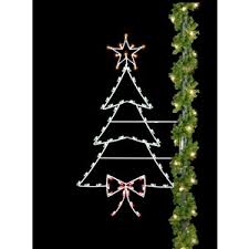 The same applies for atmospheric christmas lights outside on the streets or inside our cozy home. Christmas Tree Silhouette Pole Mount Decoration