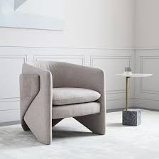 Inspired By Innovative Avant Garde Architecture Our Designers Wrapped Curved Forms To Create The Th Furniture Design Chair Furniture Design Armchair Furniture