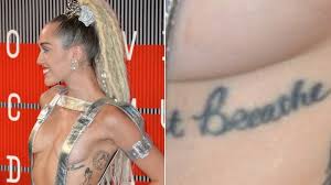 Looking for miley cyrus's tattoos? Miley Cyrus Most Meaningful Tattoos Explained