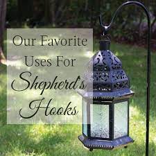 Our Favorite Uses For Shepherd S Hooks Linentablecloth Shepherds Hooks Shepherd Hook Ideas Decor Shepherd Hook Ideas Garden