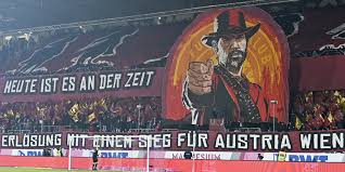 It is the capital of the republic of austria and by far the largest city in austria with its population of more than 1.7 million. Austria Wien Fans Entzuckten Bei Wiener Derby Mit Rdr2 Choreografie Games Derstandard De Web