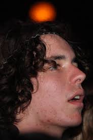 Near ten, singer/guitarist Billy Lunn walked onstage, shirtless,  "strawberry blonde" tattooed across