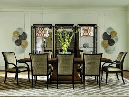A transitional dining room is based on the traditional design style but it has tendencies leaning toward the more contemporary styles. High Style Transitional Dining Table