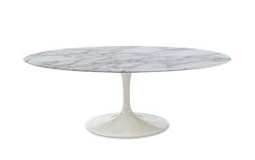 The unique single pedestal base is made from strong cast. Iconic Interiors Marble Tulip Dining Table Oval