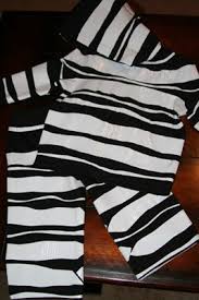 Once dry and painted on both sides remove the tape and you have your self a zebra costume. Diy Halloween Zebra Costume