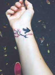 This is a very creative design, especially for women. Cherry Blossom Branch With Bird Tattoo That I Had Done Today Blossom Tree Tattoo Cherry Blossom Tree Tattoo Cherry Blossom Tattoo