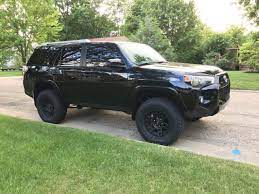 Finally got all the money ready just over a year got a 2.5 inch lift in the front and 2 inch in the back, i just ordered trd 17 alloy wheels and can't decide weather 275/70/r17 or 285/70/r17 will be best, my control arms are rubbing the slightest bit with 265/70/r17 and i'm wondering if a wheel spacer will fix the problem even after i get the bigger tires. 2017 Sr5 Premium With Factory Lift And 35 Tires Toyota 4runner Forum 4runners Com