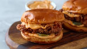 Next, dip each piece into the hot sauce, coating both sides. Diy Popeyes Chicken Sandwich Gimme Delicious