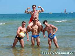 Calendar features athletic, naked, young British men running around on  beach - Outsports