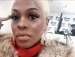 Lil' Mo leaves husband after he spit