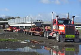 bill rowes heavy haulage tauranga new zealand with a 110 tonne bridge beam here is a 6x4 high specced west western star trucks big rig trucks white truck