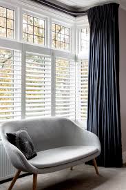 Bay windows are a beautiful feature in any room, but dressing them can be tricky business. Bay Window Shutters Wooden Shutters Plantation Shutters