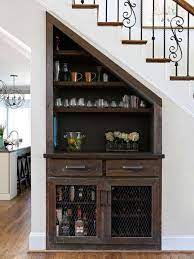 17 Clever Uses For The Space Under The Stairs Bar Under Stairs Under Stairs Stairs