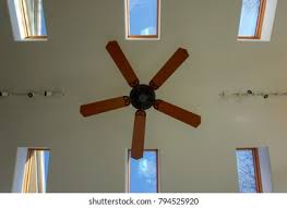 This ceiling fan buying guide helps you choose the size, style, and downrod length that suits your space and decor—installation tips ceiling fan buying guide. Large Ceiling Fan Tall Room Skylights Stock Photo Edit Now 794525920