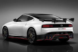 nissan 400z nismo looks ready to fight the toyota supra grmn fatter tailpipes a giant rear wing and a carbon fiber kit mak upcoming cars nissan toyota supra