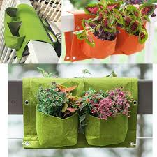 Convenient selfwatering railing planter boxes in seconds adjusts to fit a variety of railing planter read customer reviews and with trellis has a hanging planter boxes with our selection of deck and more. Must Have Bloembagz Deck Rail 4 Pocket Hanging Planter Bag Honey Dew From Bloem Accuweather Shop
