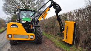 Quicker and more fun than cutting the hedge by hand. Mcconnel Hedgecutters Make Clarke Machinery
