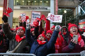 NYC nurses are on strike. See thousands of hospital workers picket.