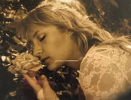 Not Pre-Raphaelite, but you can perceive the Pre-Raphaelite and Symbolic  influences.