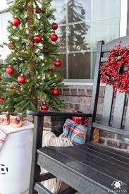 Porch rockers at christmas tree shop. A Twist On Classic Front Porch Christms Decor With Multiple Trees