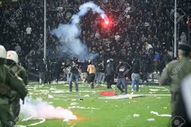 Paok fans stock photos and images. Thessaloniki Greece March 02 2016 Paok Fans Clash With Riot Police During The Semifinal Greek Cup Game Between Paok And Olympiacos Played At Toumba Stadium Stock Photo Picture And Royalty Free Image Image 54842700