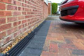 Channel drain, trench drain, 5 nds channel drain, across driveway. Installing Channel Drains Correctly The New Driveway Company