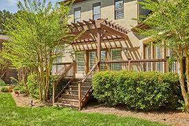 An outdoor deck is a great way to maximize your home's living space and connect the indoor living area with your backyard. 11 Deck Patio Landscaping Ideas Decks Com