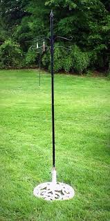 Bird Feeder Pole For Deck Lowes Used An Old Umbrella Stand As A Base For My Shepherd S Hook Now I Can Easily Move My Bird Feeder Wherever Umbrella Stand Bird House Feeder Bird Feeder Stands