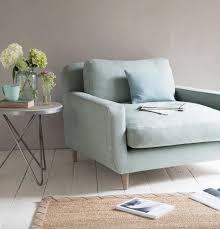 Loaf S Comfy And Cosy Snuggalump Love Seat In A Light Duck Egg Linen With A Vase Of Fresh Blooms Duck Egg Blue Living Room Furniture Love Seat