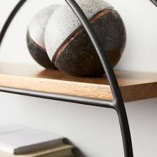 Leaning wood and metal wall shelving unit could easily be used on a kitchen. Round Wood Metal Shelf West Elm United Kingdom
