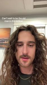 Man in Recliner Says Hey