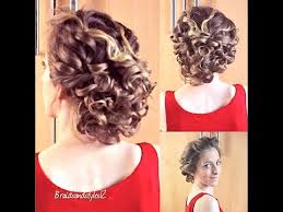 Use a hair clip to keep it in place, letting loose curls to hang across the forehead or on the sides of your face. Curly Updo Hair Tutorial Braidsandstyles12 Youtube