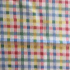 Instead of choosing three different plaids, try one floral, one plaid and a check pattern. Spring Plaid In Pastel Blue Pink Green Yellow Home Decor Fabric 55 Wide Fabric Warehouse