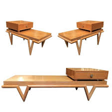 We offer coffee tables in all shapes, sizes and even some with drawers! Custom Boutique Midcentury Coffee Table And Side Table Set With V Shaped Legs For Sale At 1stdibs