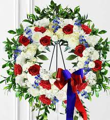 Maybe you would like to learn more about one of these? Red White Blue Sympathy Wreath Avas Flowers