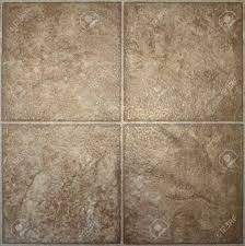 It is very durable, easy to clean and moreover naturally soft, which makes it feel comfortable to walk on. Four Squares Of Brown Textured Linoleum Floor Tile Stock Photo Picture And Royalty Free Image Image 12363415