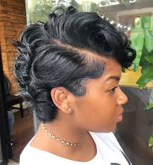 Style the hair forward and boost the texture in the layers to give off a mysterious, sexy vibe. 50 Most Captivating African American Short Hairstyles Short Hair Styles African American Natural Hair Styles Hair Styles
