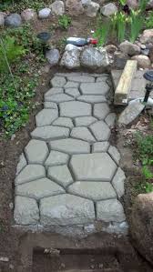 Cobblestone Pathway Form From Lowes And Pre Mixed Concrete For A Quick And Easy New Look To My Garden Path Outdoor Gardens Garden Pathway Garden Paths