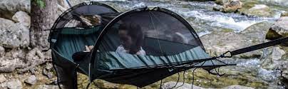 Those with spreader bars, generally wood pieces at either end which keep the hammock held open; Lawson Blue Ridge Camping Hammock Tent Review Hammok Town Hammock Town
