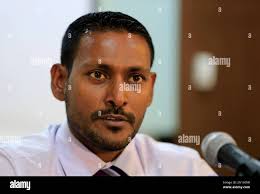Maldives Vice President Ahmed Adeeb's lawyer Hussain Shameem speaks to the  press in Male, Maldives, Saturday, Oc. 24, 2015. Adeeb will be charged with  high treason after being arrested Saturday at the